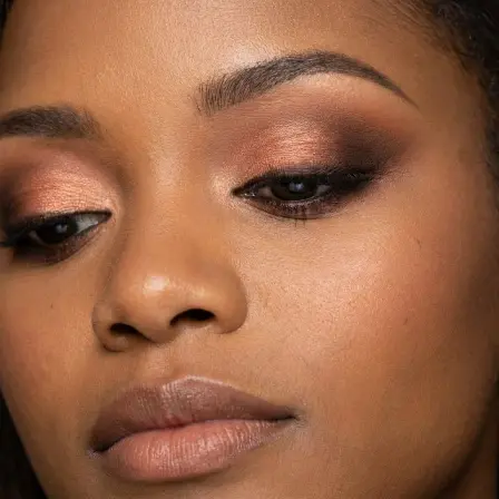 Woman wearing an eye makeup look rendered on her own selfie by BeautySpark