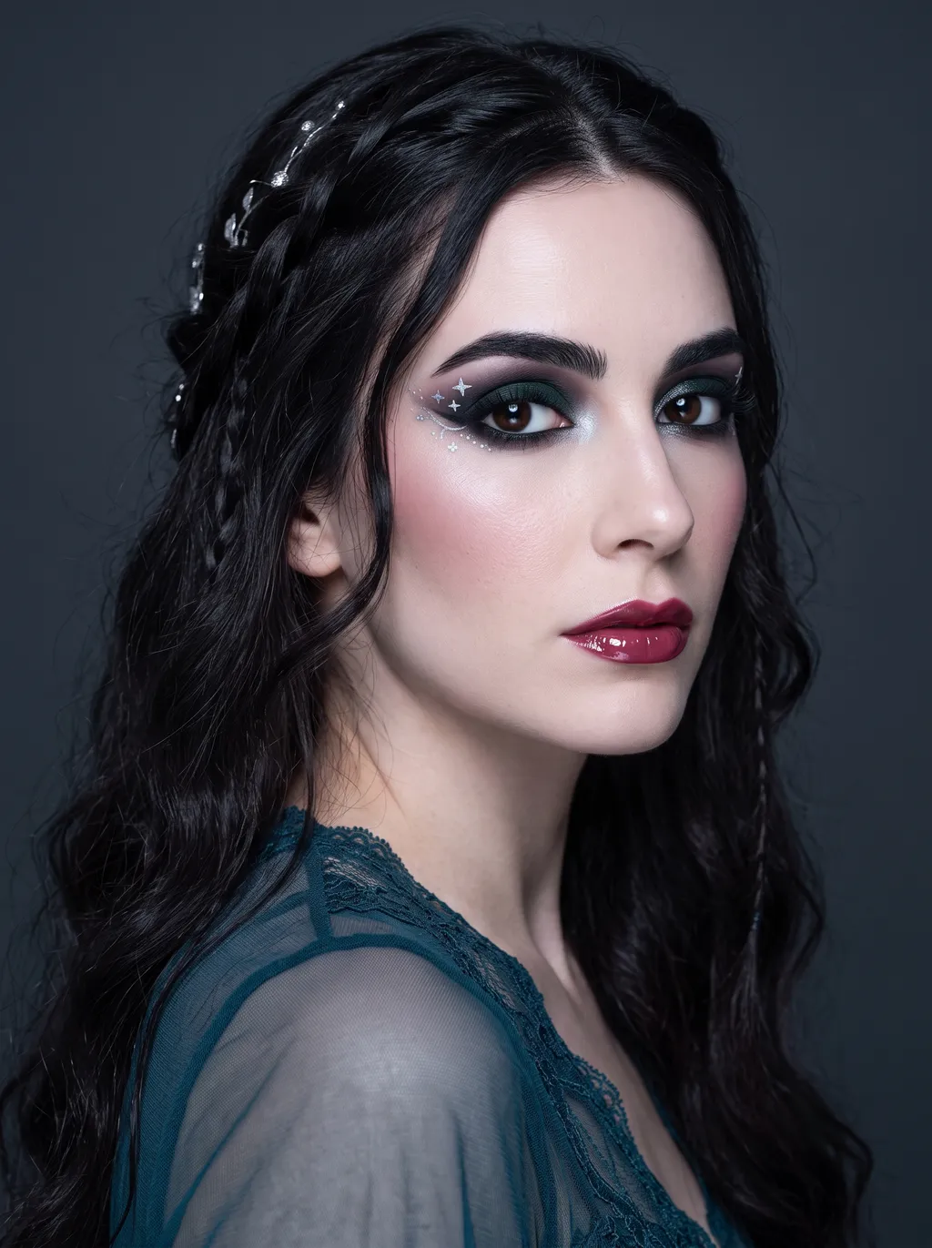 Dark Winter eye with a deep pine-to-blackberry two-tone wash, a charcoal-deepened outer corner, a glossy icy-silver dew-drop gel accent at the inner corner reading as moonlight, and crisp silver stars trailing the outer corner, cool deep coloring