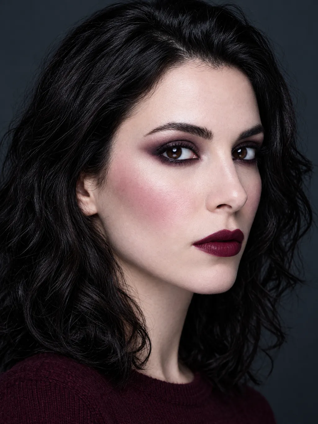 Cool-cocoa and dark cool-burgundy smoky eyeshadow with a black-cherry lip on Dark Winter coloring