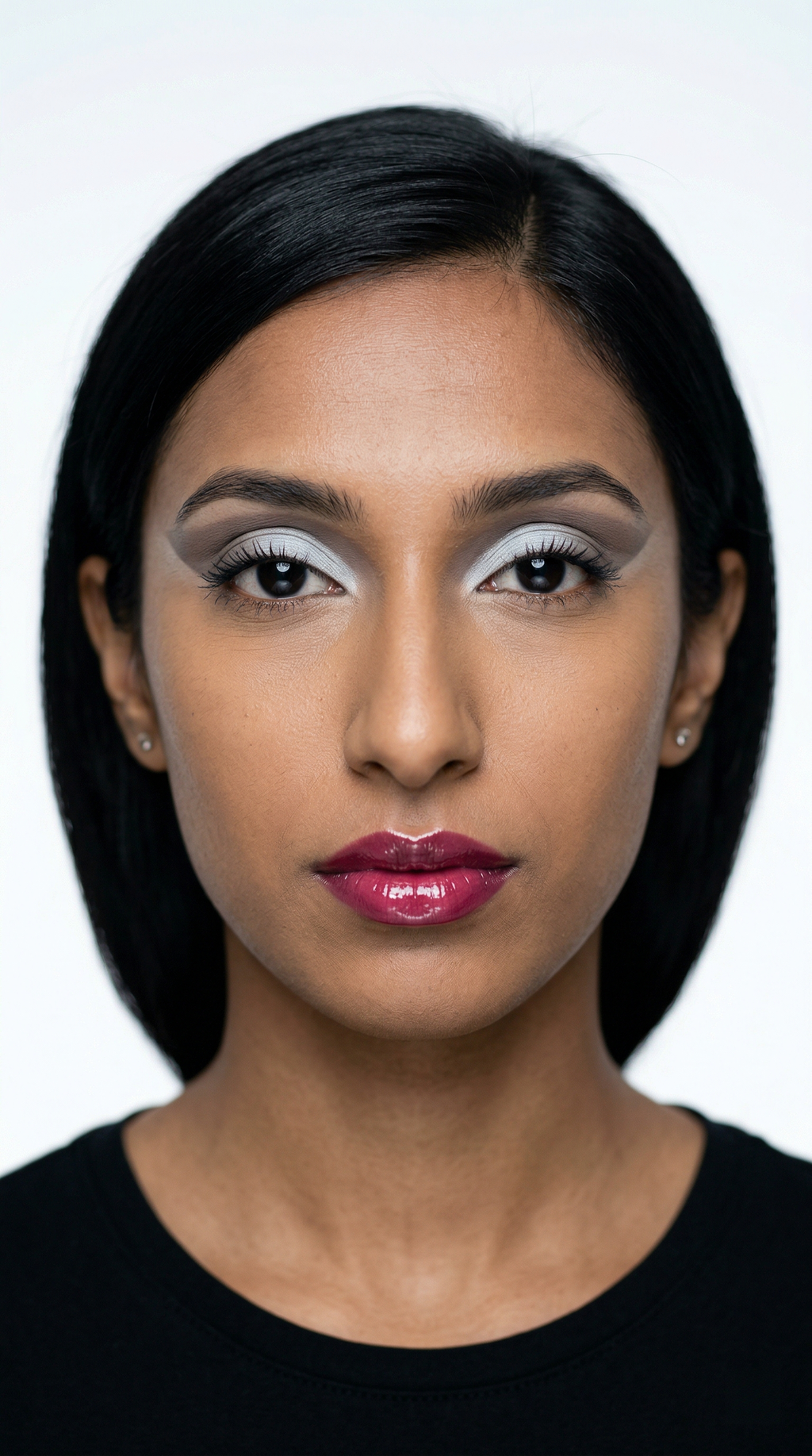 Precision cut crease eyeshadow with a glossy berry lip
