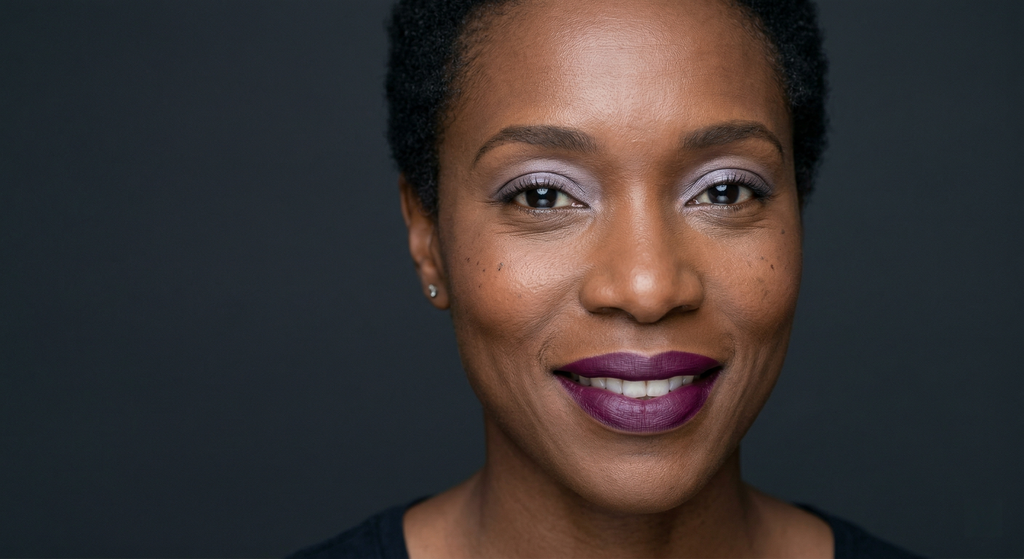 Minimal eye makeup with a bold statement lipstick
