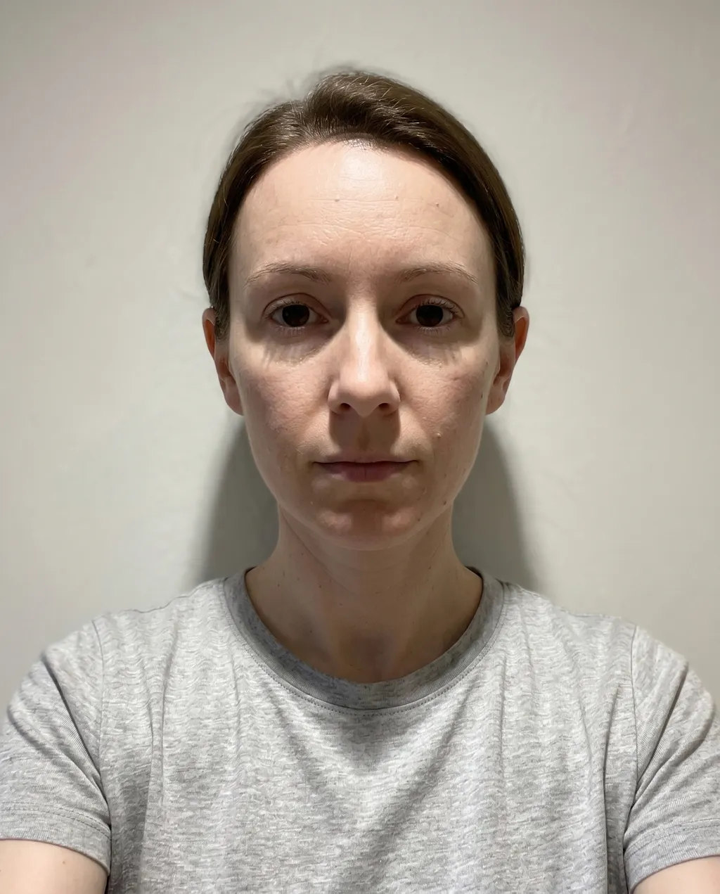 Selfie taken in mixed artificial lighting showing inconsistent color temperature across face