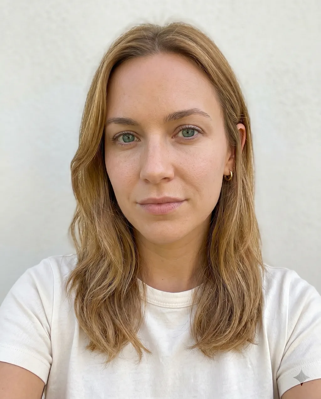 Bare-faced selfie showing natural skin tone after removing all makeup